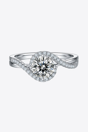 Silver swirl halo moissanite engagement ring with diamond accents
