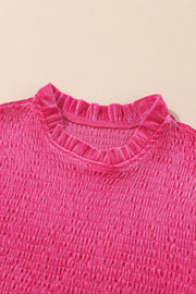 Hot Pink velvet smocked bodice mini dress with ruffled mock neck.