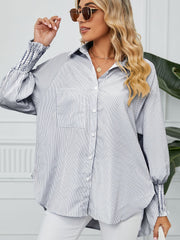 Balloon sleeve stripe shirt with button-up front and smocked cuffs.