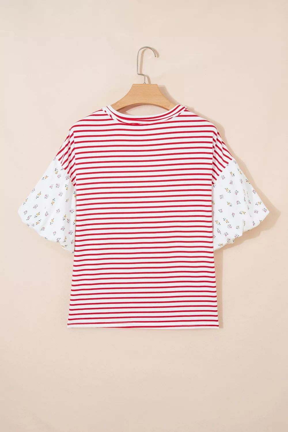 Maternity shirt with red and white stripes and floral patchwork puff sleeves.
