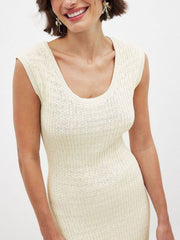 Scoop neck knit midi dress in apricot with a textured pattern and sleeveless cut.