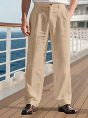 Men's khaki striped wide-leg sweatpants with a relaxed fit.