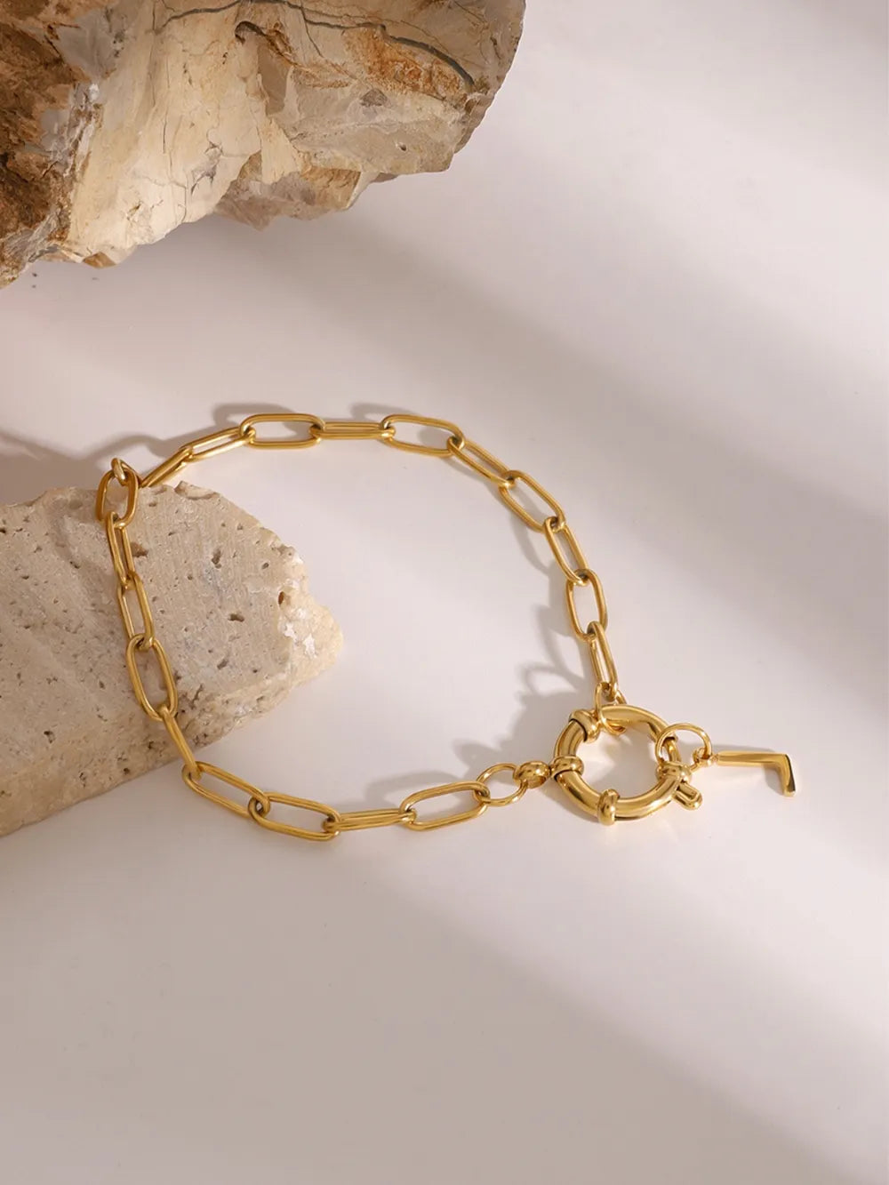 Gold chunky chain bracelet with toggle clasp and initial charm