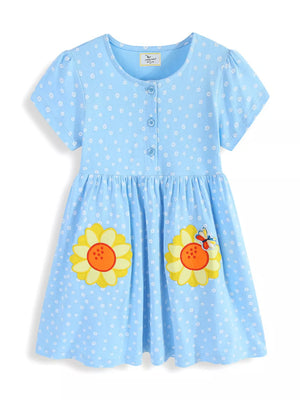 Blue cotton toddler dress with white floral print, embroidered sunflowers, and butterfly detail.