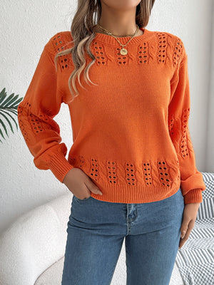Orange knit sweater with openwork details on sleeves and hem, crew neck, long sleeves.