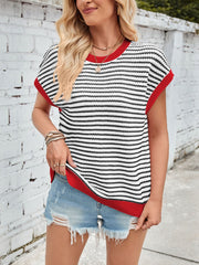 Textured stripe knit top with cap sleeves and red trim, styled with denim shorts.