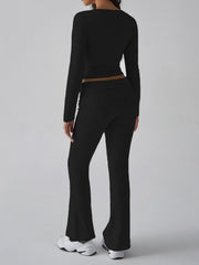 Black long sleeve loungewear set with square neckline and flared pants.