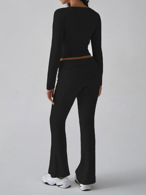 Black long sleeve loungewear set with square neckline and flared pants.