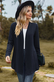 Dark blue textured open-front drape cardigan with a relaxed fit and long sleeves.