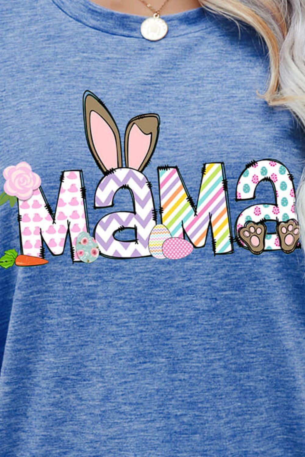 Misty Blue graphic tee with Easter Mama bunny ears, eggs, carrots, and floral details.