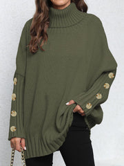 Green turtleneck sweater with button cuffs and ribbed details