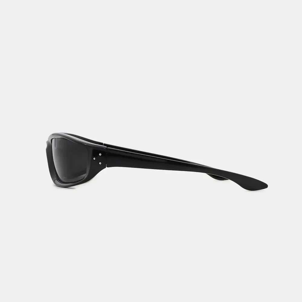 Black sculpted sport sunglasses with dark lenses and silver stud detail.