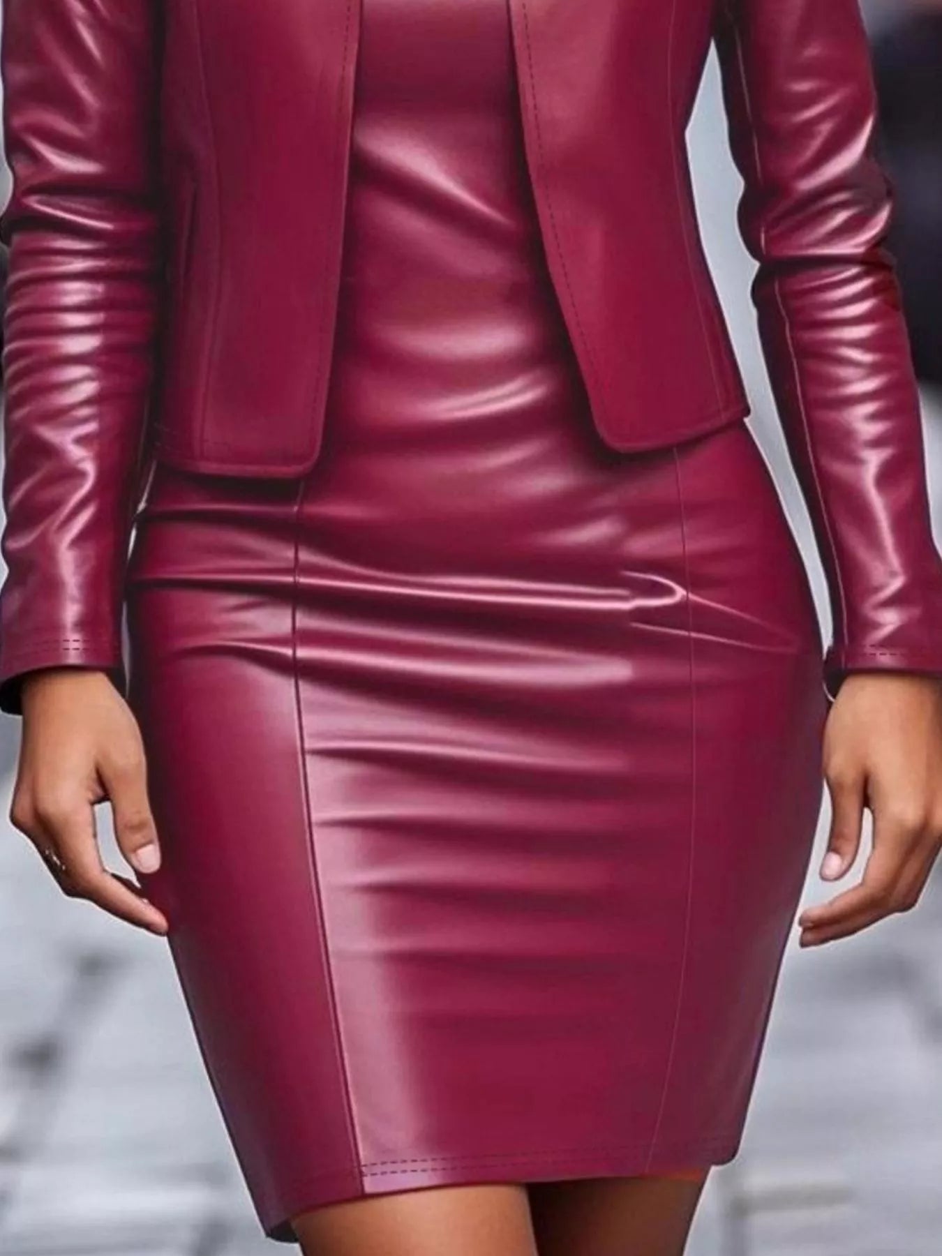 Burgundy leather jacket dress set with fitted skirt and long sleeves.