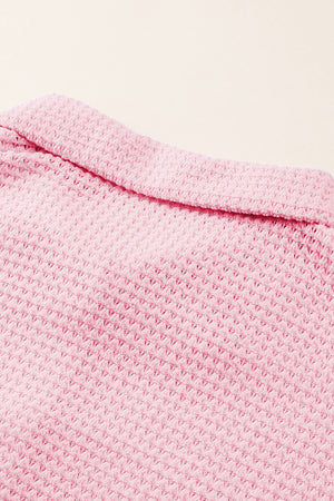 Blush pink waffle knit button-down shirt jacket with collar detail