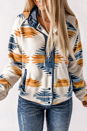 Navajo Fleece Snap-Front Jacket in multicolor with blue trim and snap buttons, featuring a geometric pattern.