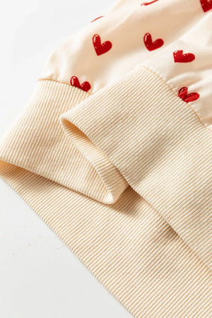 Heart Print Round Neck Long Sleeve Sweatshirt in Cream, fit detail