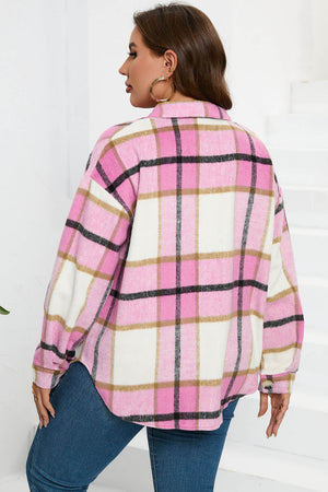 Oversized pink checkered shacket with button front and patch pocket detail.