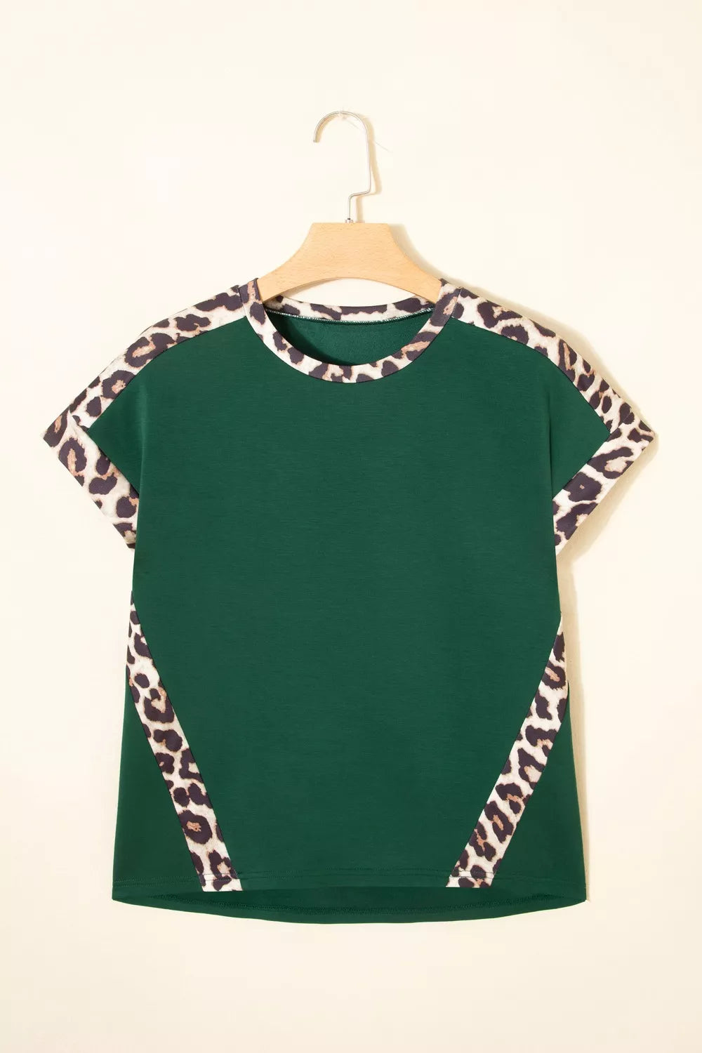 Green polyester t-shirt with leopard print accents on sleeves and sides.