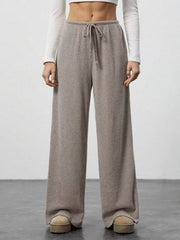 Relaxed wide-leg pants in mocha ribbed knit with drawstring waist.