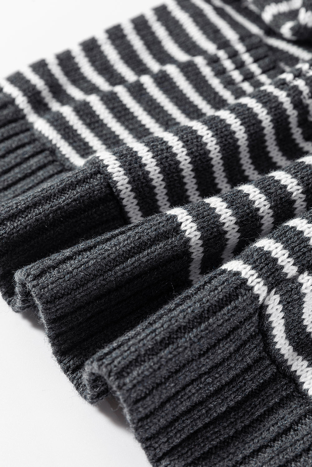 Gray striped knit polo vest with ribbed texture and neckline detail.