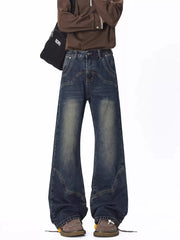 Men's vintage wash wide leg jeans with distressed details and a relaxed fit.