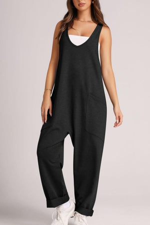 Black relaxed fit pocketed jumpsuit with V-neck and cuffed ankles.