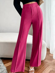 Sleek high-waisted flare maternity pants in cerise with front seams.