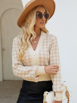 Tan houndstooth cropped cardigan with pearl button and V-neck.