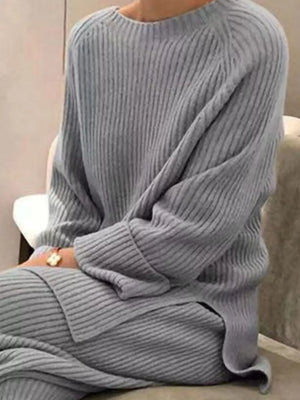 Gray ribbed knit sweater and pants set with crew neck and long sleeves.