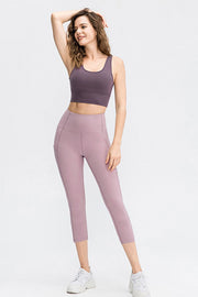 Lilac capri leggings with phone pockets and a high waist.
