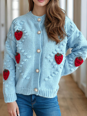 Pastel blue knit cardigan with strawberry appliques and pearl buttons.
