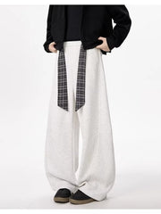 Light gray relaxed fit wide-leg sweatpants with a plaid tie belt.