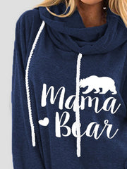 Dark blue cowl neck hoodie with white Mama Bear graphic and drawstring.