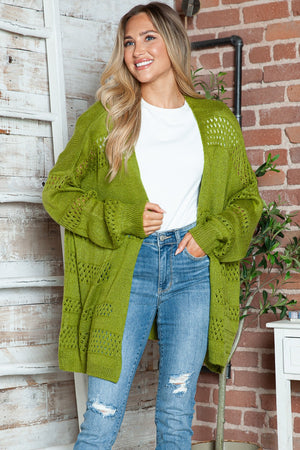 Open-knit slouchy cardigan in matcha green with a relaxed fit and open front.