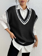 Black acrylic knit vest with varsity stripes and pearl trim neckline.