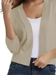 Beige cropped elbow-sleeve open-front knit cardigan with ribbed sleeves.