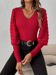 Deep Red ribbed bodysuit with V-neck and sheer pom-pom detail sleeves.