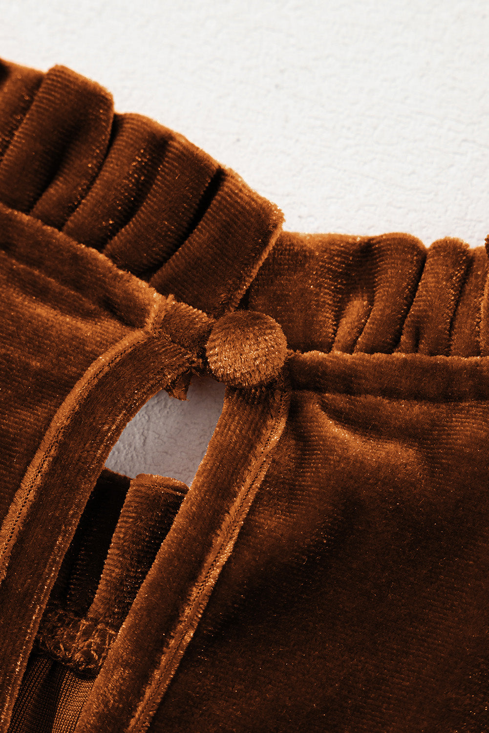 Brown velvet blouse with gathered neckline and button detail