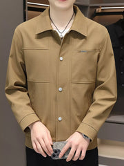 Men's caramel snap down jacket with textured fabric and chest pockets.