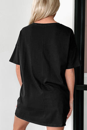 Black graphic t-shirt with short sleeves and a relaxed fit.