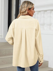 Cream corduroy overshirt with back pleat detail and buttoned cuff.