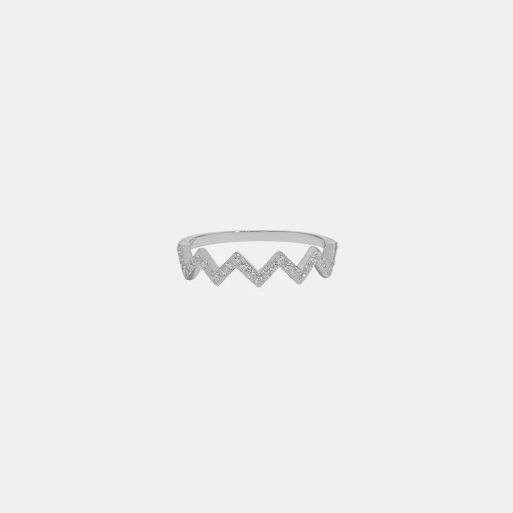 Silver zigzag pavé band ring with small stones