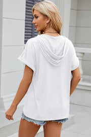White hooded t-shirt with rolled short sleeves and a relaxed fit.