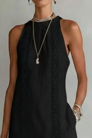 Black midi dress with pockets and lace trim detail