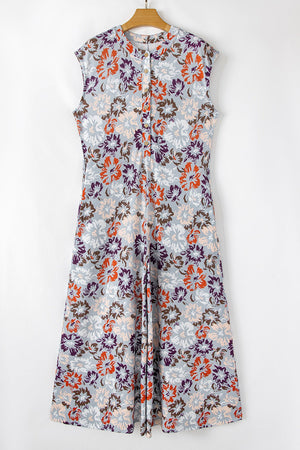Floral cap-sleeve jumpsuit with a button-up front and wide legs.