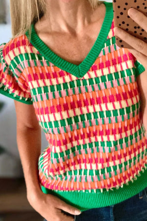 Geometric knit v-neck top with flutter sleeves in green, orange, pink, and cream.