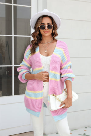 Open knit cocoon cardigan with rainbow stripes in pink, yellow, and blue acrylic.