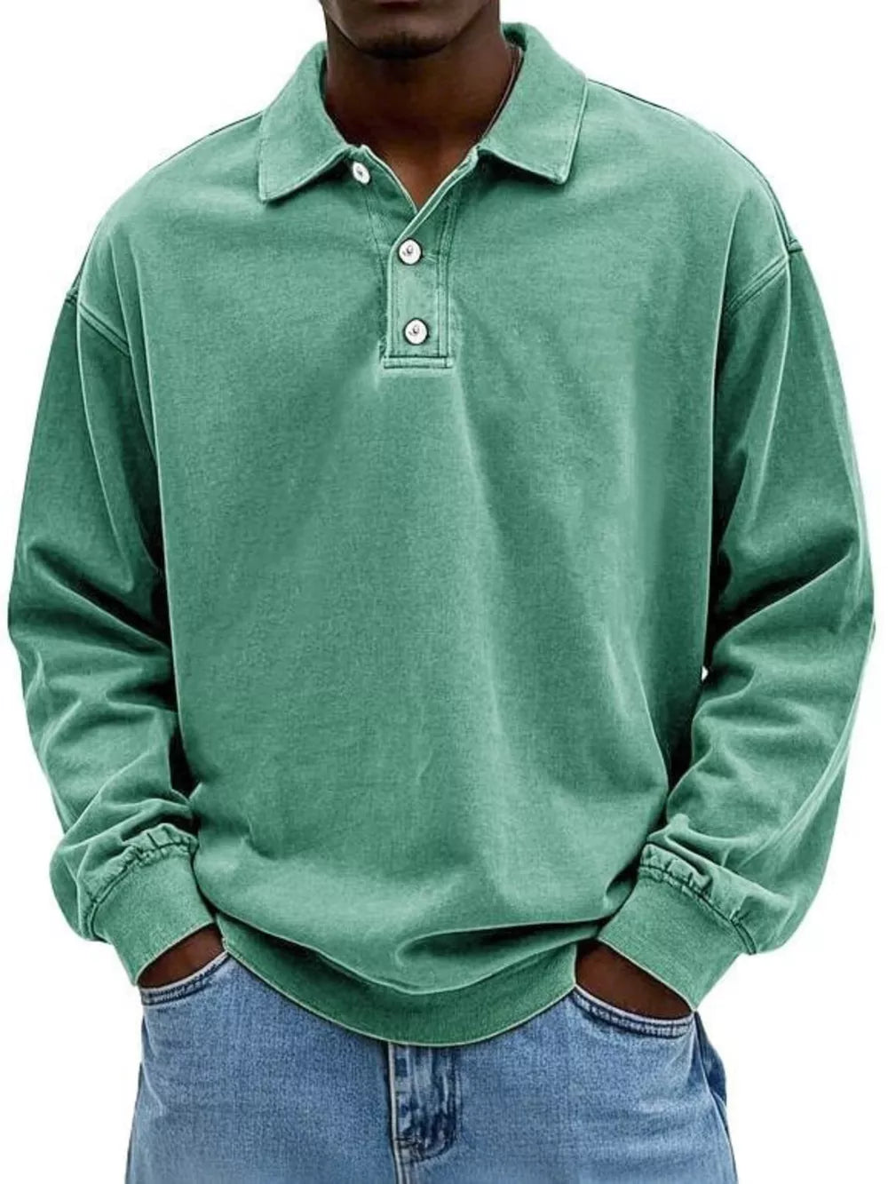 Men's vintage washed light green long sleeve cotton polo shirt with buttoned placket.