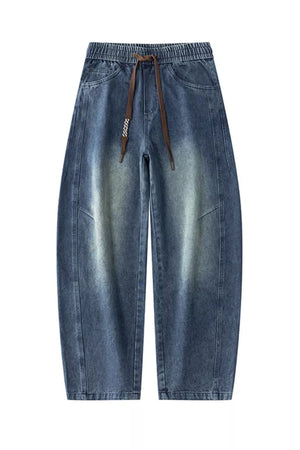 Blue vintage wash wide-leg jeans for men with drawstring and elastic waistband.