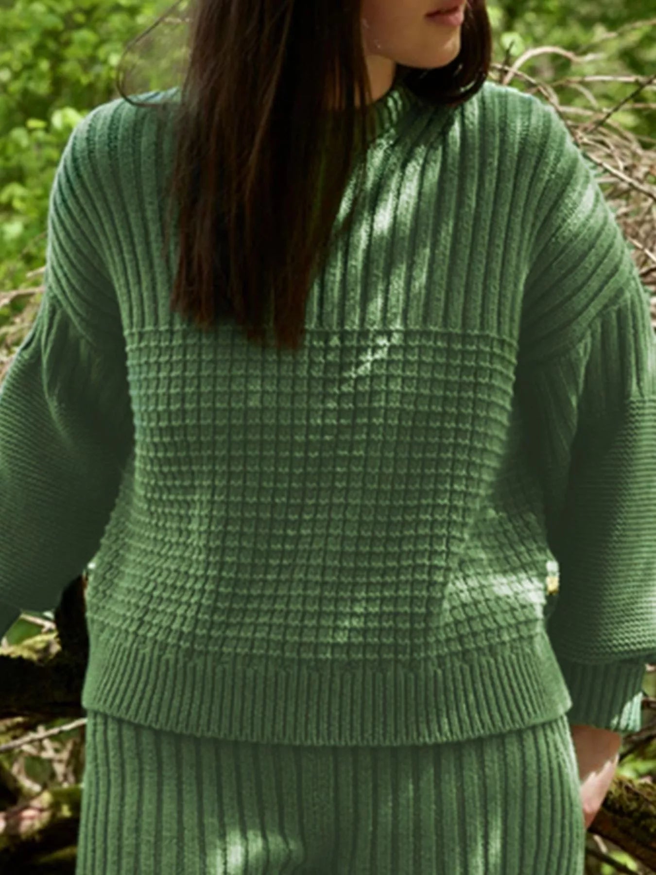 Moss textured knit round-neck pullover sweater with waffle and rib knit details.